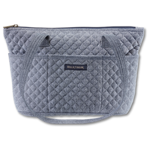 Small Tote front view featuring quilted solid, in soft blue, with top zip closure, and 10 total pockets.