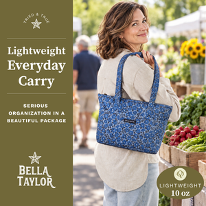 Side-view of woman carrying Small Tote, highlighting quilted floral fabric, structured silhouette, and lightweight 100% cotton construction.