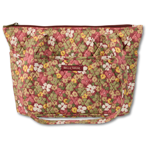 Small Tote front view featuring quilted floral print, in cream, green, & yellow, with top zip closure, and 10 total pockets.