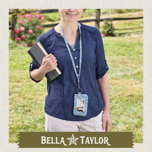 Front-view of woman wearing ID Lanyard highlighting clear plastic front ID window.