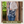 Front-view of woman carrying Hipster highlighting quilted patchwork fabric, structured silhouette, and lightweight 100% cotton construction.