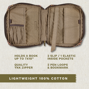 Open top-down view revealing interior with three pockets, two pen loops, YKK zipper, bookmark ribbon, and room for a book up to 7" x 10".