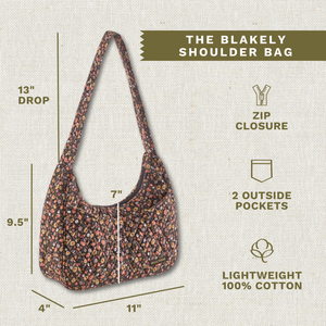 Callout image showing dimensions 11" x 9.5" x 4", 13" strap drop, 2 exterior pockets, lightweight 100% cotton construction.
