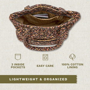 Open top-down view revealing interior with 3 inside pockets. Callouts highlighting top zip closure and machine washable design.