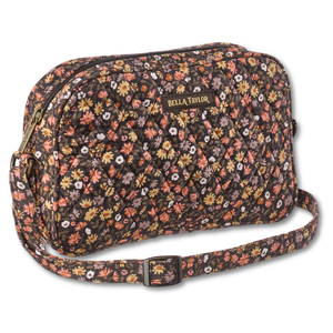 Simple Crossbody front view featuring quilted floral fabric in espresso brown, golden tan, soft ivory, and dusty mauve with top zip closure, and 3 total pockets.