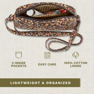 Open top-down view revealing interior with 2 inside pockets. Callouts highlighting top zip closure and machine washable design.
