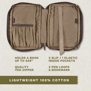 Open top-down view revealing interior with three pockets, two pen loops, YKK zipper, bookmark ribbon, and room for a book up to 6" x 9".