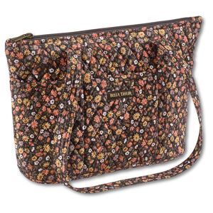 Small Tote front view featuring quilted floral print, in espresso brown, golden tan, soft ivory, and dusty mauve, with top zip closure, and 10 total pockets.