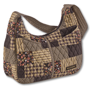Blakely Shoulder Bag front view featuring quilted patchwork fabric in espresso brown, golden tan, soft ivory, and dusty mauve, with top zip closure, and 5 total pockets.