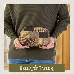 Top-down view of woman holding open cosmetic pouch, showing what fits inside.