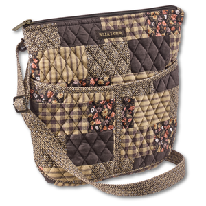 Hipster front view featuring quilted patchwork fabric in espresso brown, golden tan, soft ivory, and dusty mauve, with top zip closure, and 6 total pockets.
