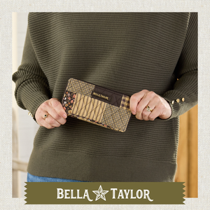 Front-view of woman holding Slim Card Wallet made with lightweight 100% cotton.
