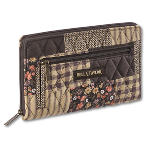 Wrist Strap Wallet front view featuring quilted patchwork fabric in espresso brown, golden tan, soft ivory, and dusty mauve.