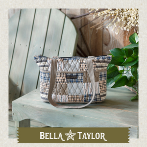 Side-view of woman carrying Small Tote, highlighting quilted patchwork fabric, structured silhouette, and lightweight 100% cotton construction.